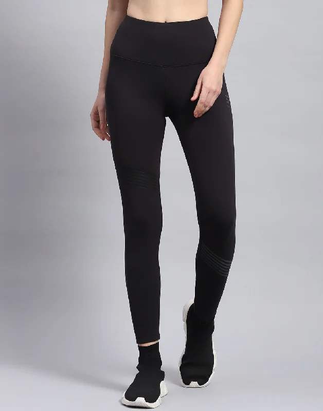 Women's Metallic Tight Trousers in Gold for a Glamorous Party EnsembleWomen Black Solid Regular Fit Legging